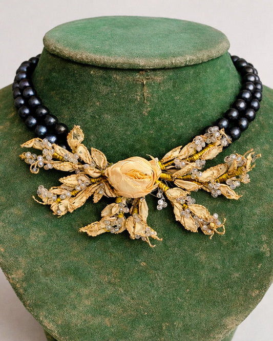 Vintage Black Faux Pearl Necklace With Gilded Floral Centerpiece